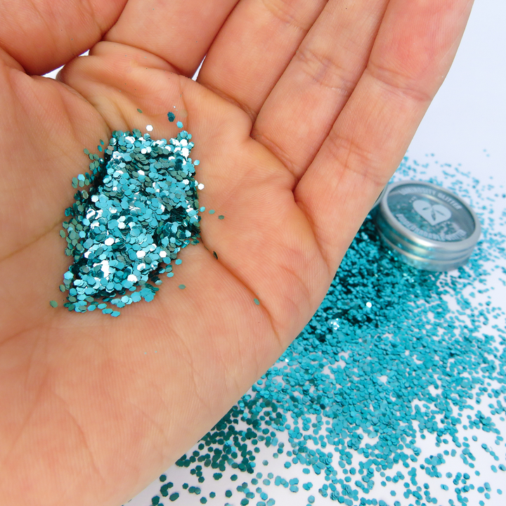 turquoise chunky eco glitter. Loose cosmetic glitter for festival glitter bars and body art.