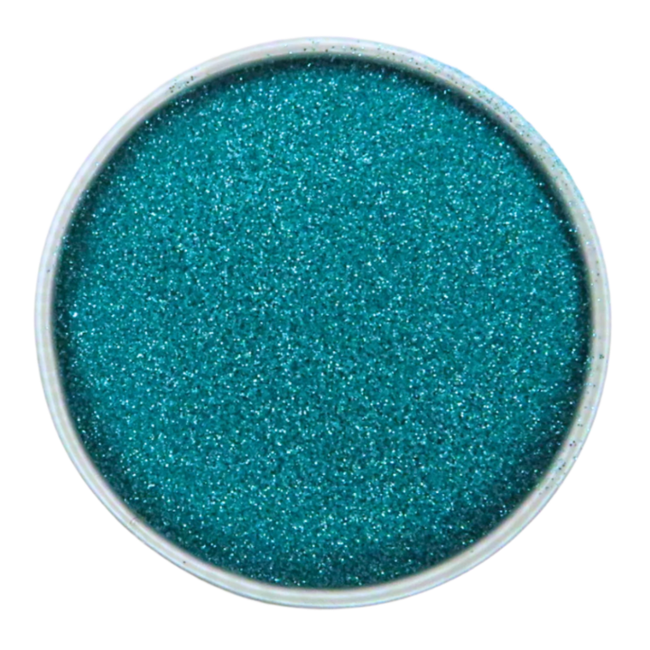 A round container filled with bright turquoise ultra-fine glitter, viewed from above