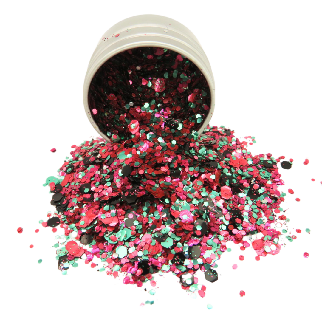 Watermelon eco glitter makeup blend by Luminosity Glitter is a mix of red, magenta, green and black eco friendly glitter in fine, chunky and super chunky sizing.