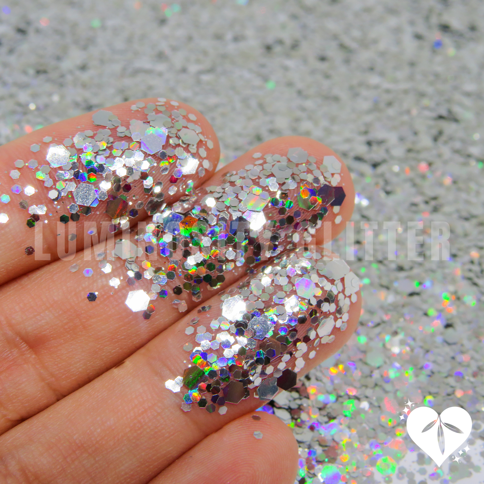 Holographic biodegradable cosmetic glitter mix by Luminosity Glitter