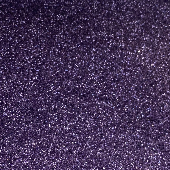 A close up of purple fine biodegradable glitter