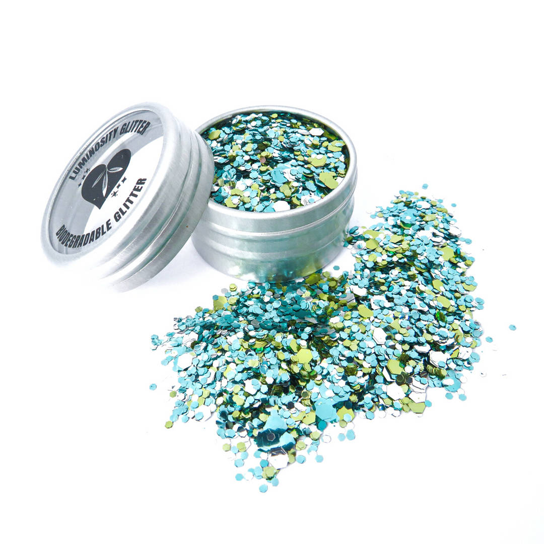 Pineapple kisses blend of turquoise, silver and gold eco friendly glitter. This glitter mix is made from fine, chunky and ultra chunky bioglitter.
