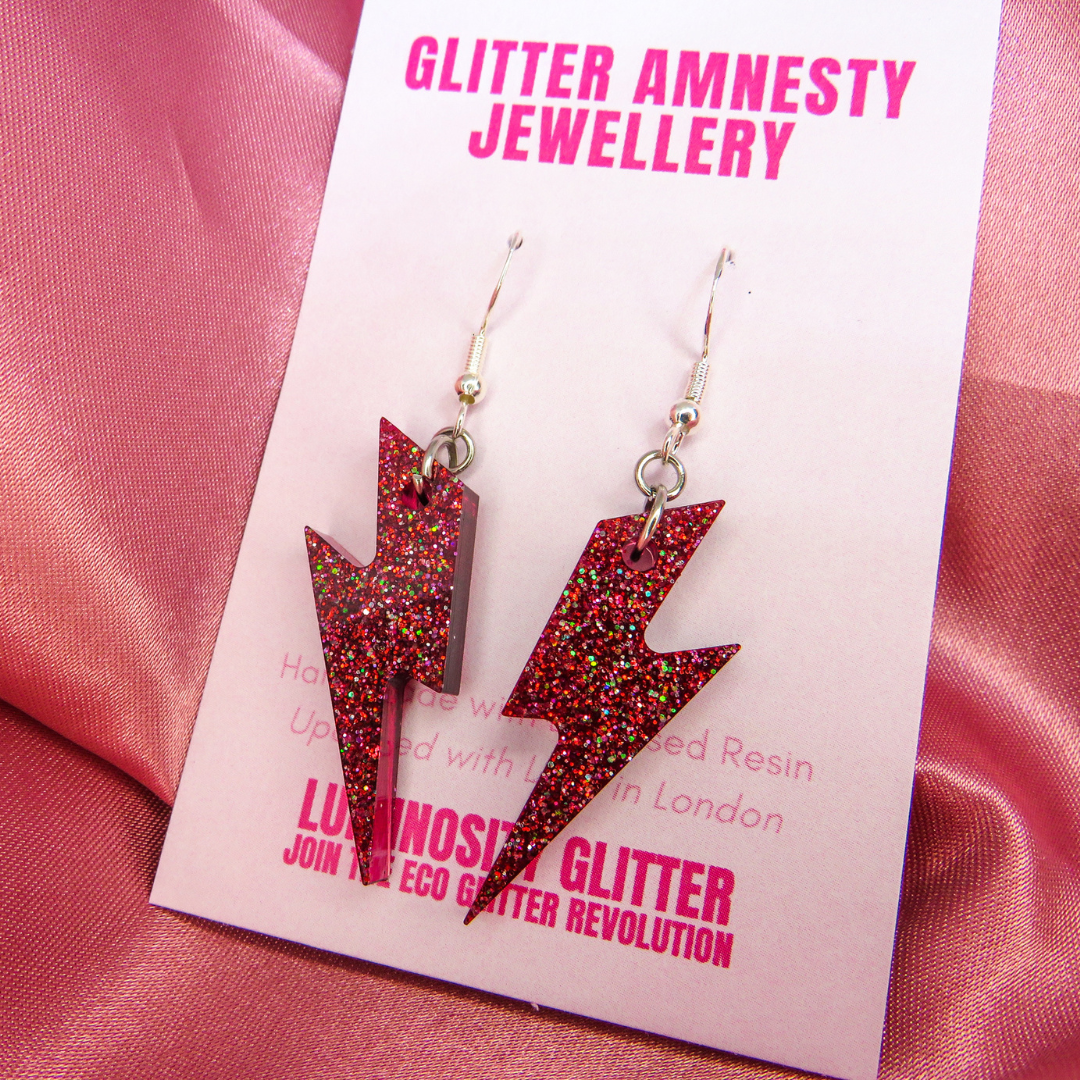 Lightning bolt earrings by Luminosity Glitter. Multi coloured resin earrings made using a sustainable biobased resin.
