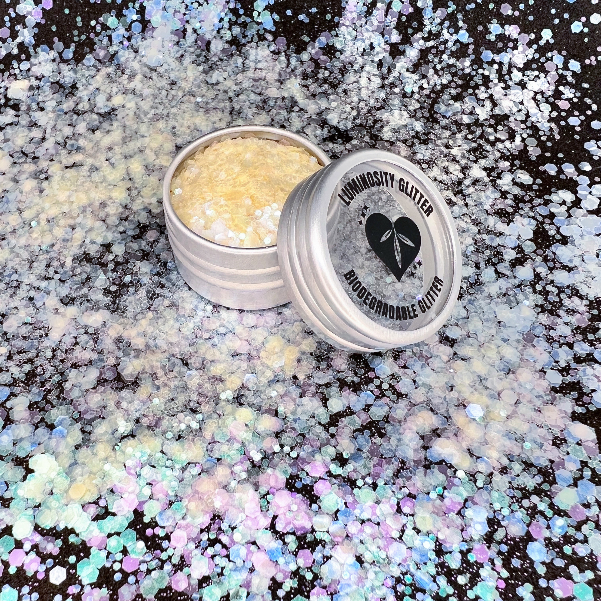 Aurora blend of 100% plastic free iridescent glitter. Made with pink, green and blue shades of our eco friendly glitter.