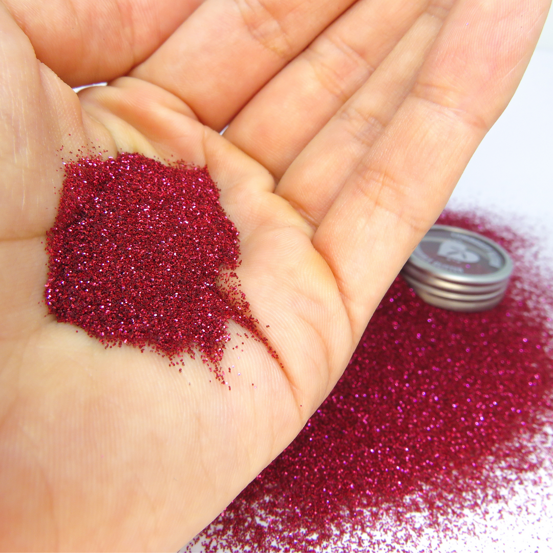 Blush red fine biodegradable glitter available in bulk bags for makeup, face painting and glitter artists.