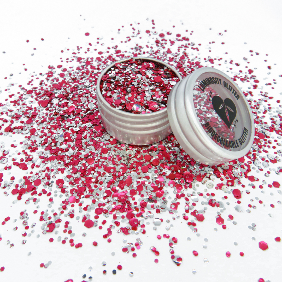 Candy Cane Christmas eco glitter by Luminosity Glitter London. This glitter is a cosmetic glitter but can also be used for crafts. A blend of silver and red glitter in fine, chunky and ultra chunky sizes.