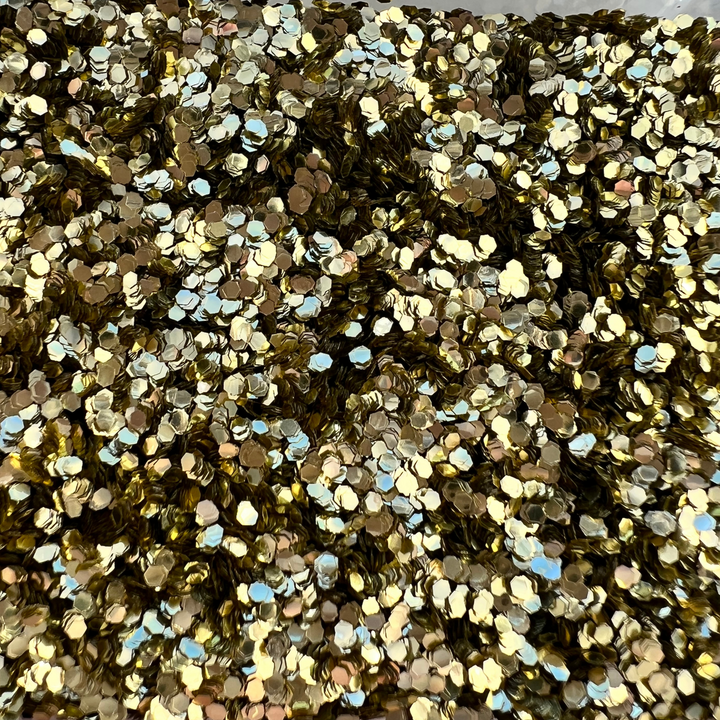 gold chunky eco friendly biodegradable glitter for glitter eye, festival hair and glittery nails.