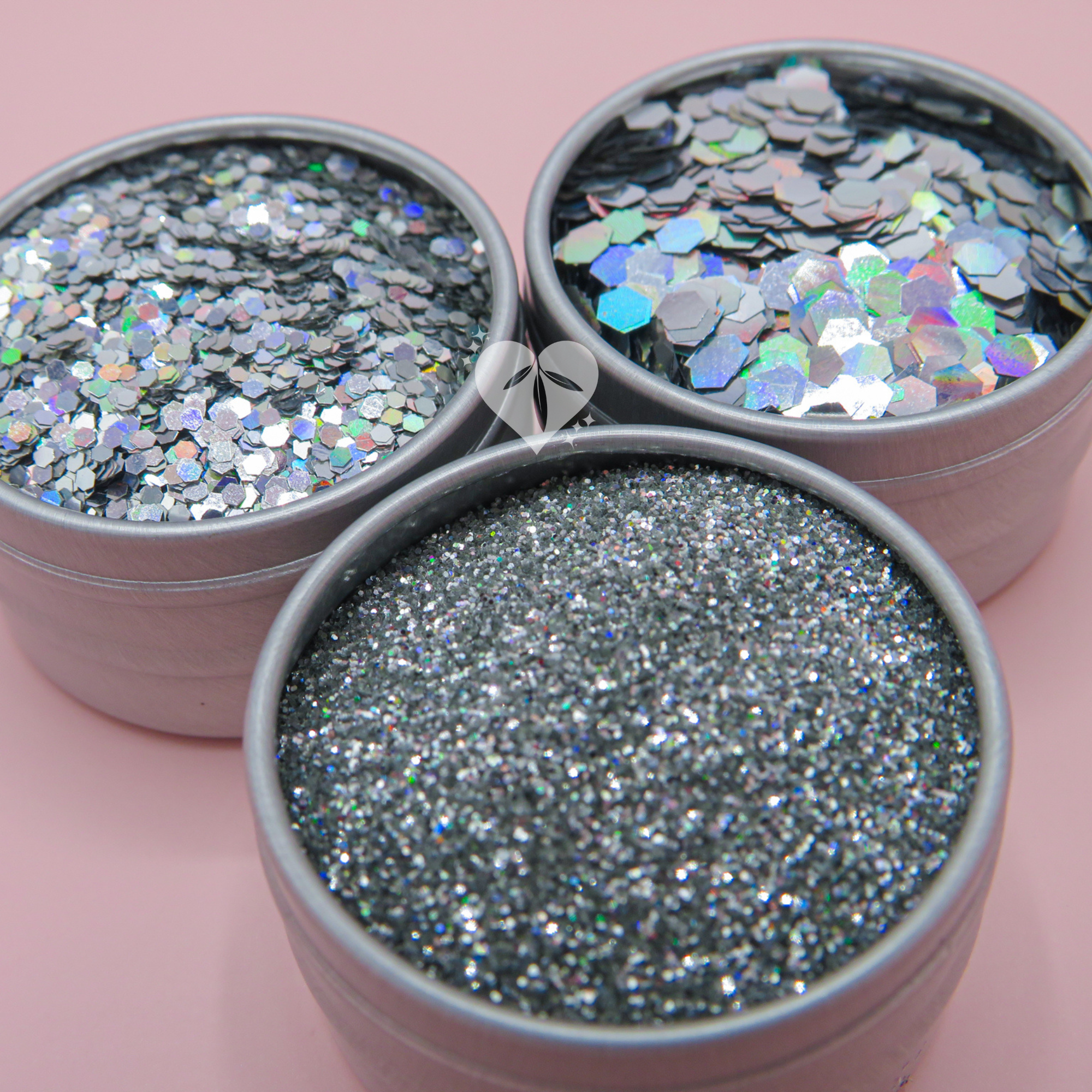 Trio of holographic biodegradable cosmetic glitters. Fine, chunky and ultra chunky glitter