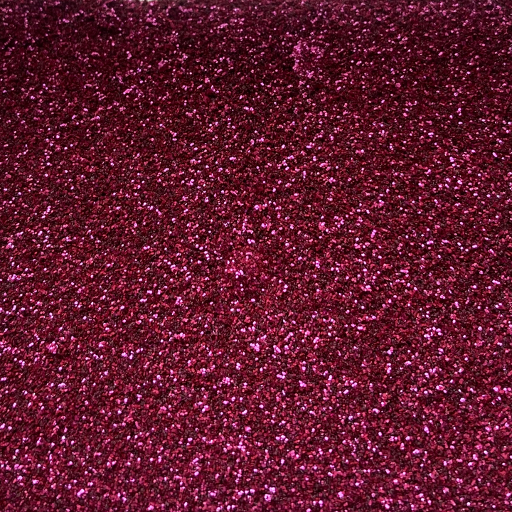 Magenta fine glitter that is cosmetic grade