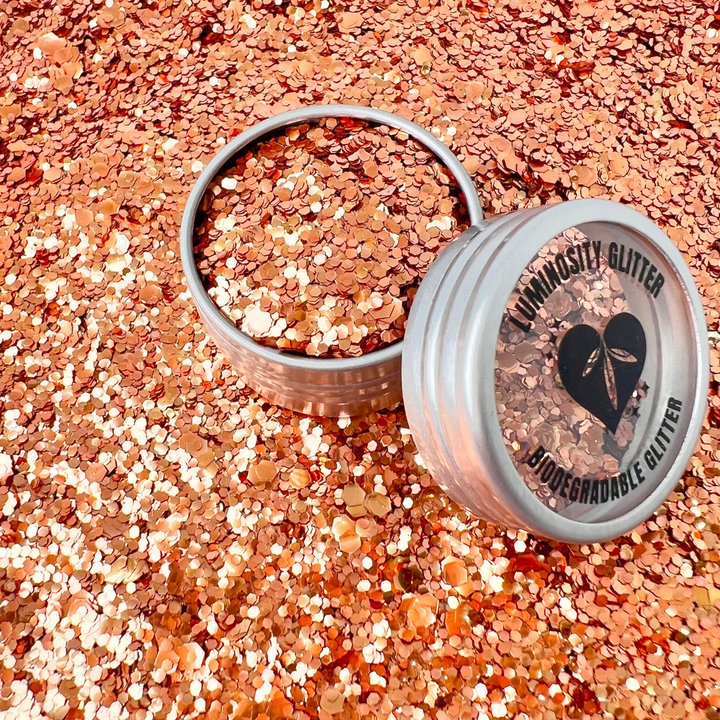 Orange blend of eco friendly biodegradable glitter made primarily from eucalyptus and proven to biodegrade in a natural environment within weeks.