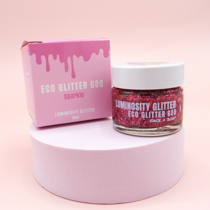 Pink glitter gel by Luminosity Glitter is suitable for your face and body. Apply with a brush or your finger.