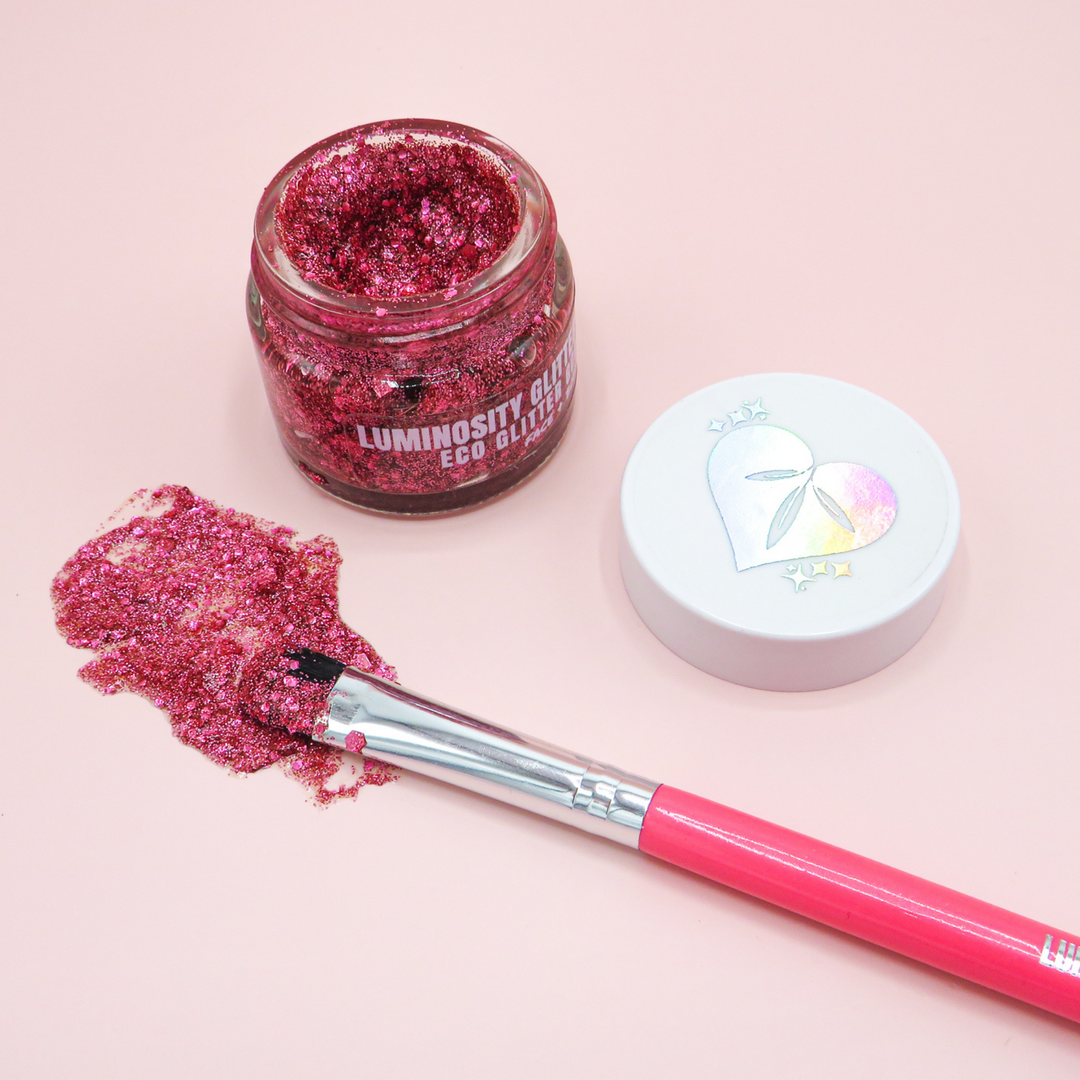 Pink cosmetic glitter gel for your face and body. By Luminosity Glitter and made using Bioglitter and aloe vera gel