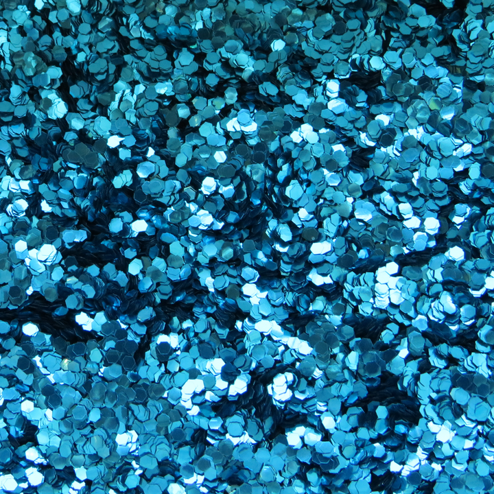 Chunky sky blue biodegradable glitter by Luminosity glitter is only available in a hexagonal shape.