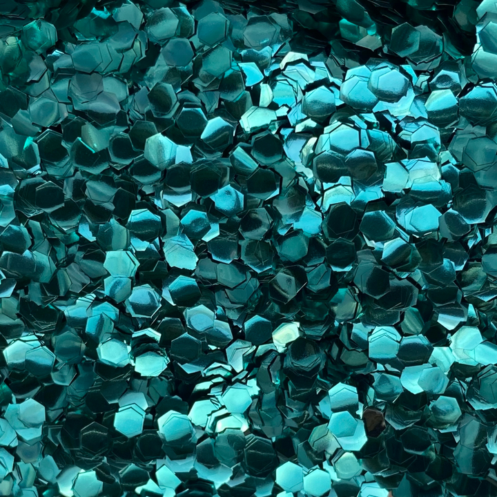 wholesale ultra chunky turquoise biodegradable cosmetic glitter. Bulk bag of glitter manufactured in the UK.