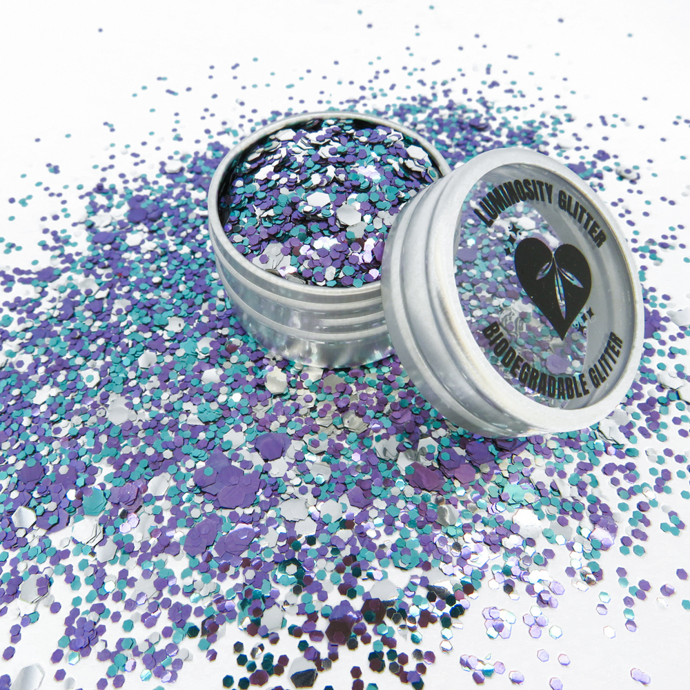 Winter Wonderland Christmas eco glitter mix by Luminosity Glitter is a mix of turquoise, violet and silver glitter in three different sizes.